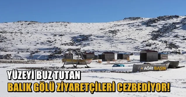 Yüzeyi buz tutan Balık Gölü ziyaretçilerini cezbediyor